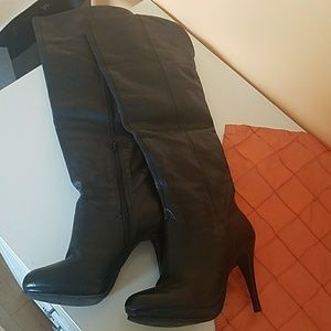 Black leather knee-high boots